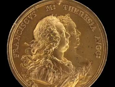 V souvislosti s oslavami ústupu Prusů od Olomouce byla medailérem Antonem Franzem Widemanem v mincovním kabinetu ve Vídni ražena stříbrná, resp. zlacená medaile. Na averzu medaile je dvojportrét panovnického páru s nápisem FRANCISCVS M: THERESIA AVGG (tj. František I. Lotrinský – Marie Terezie, Vznešení) a signatura medailéra – A. WIDEMAN. Reverz medaile zdobí alegorická scéna, na níž podává bohyně války Minerva městu Olomouci, personifikovanému ženskou postavou s hradební korunkou a s polepšeným městským znakem, vavřínový věnec. Opis zní následovně: BORUSSORVM COMMEATV – INTERCEPTO a dole v úseči je umístěn nápis o dvou řádcích OLOMVTIVM LIBERAT II. IVL. MDCCLVIII (tj. Zabavením spíže Prusů Olomouc osvobozena 2. 7. 1758). Vlastivědné muzeum v Olomouci, inv. č. 164.